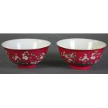 Pair of Chinese Famille Rose porcelain bowls, red glazed ground with plum flower pattern, 6 1/2"
