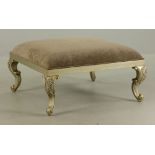 Designer Continental ottoman, silver leaf with upholstery, 18" high x 37 1/2" wide x 37 1/2" deep.