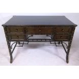 Faux bamboo desk, with five short drawers, 30" h x 47" w x 27 1/2" d.