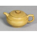 Chinese Yixing pottery teapot with Zhou Li Shan zhi mark, 2 1/2" x 6 1/2".