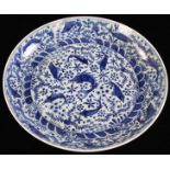 Large Chinese blue and white Ming Dynasty-style porcelain charger, 20th century, 17" diameter.