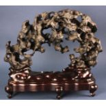 Rock mountain style Chinese scholar article with wood stand, 14" H x 15" W. Provenance: Portland,