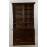 Mid-19th C. sea captain's walnut specimen cabinet with hand blown mullion glass paneled door, 86"