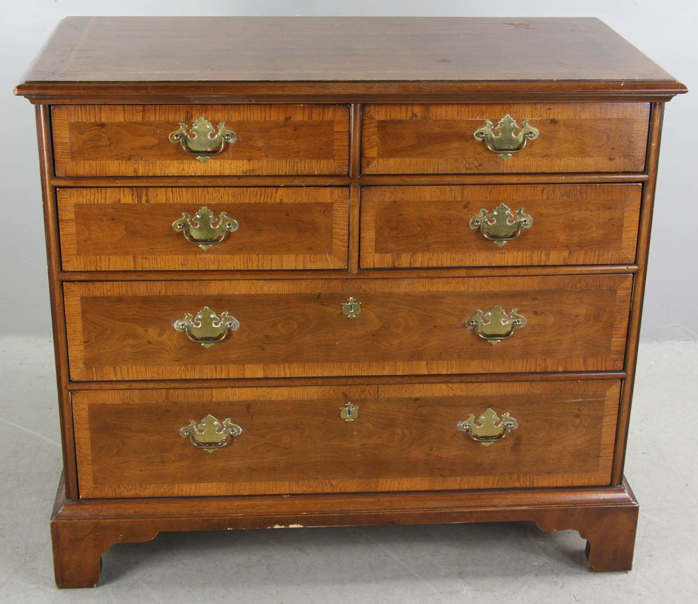 Chippendale-style banded walnut four over two-drawer chest, marked 'Henredon's 18th Century