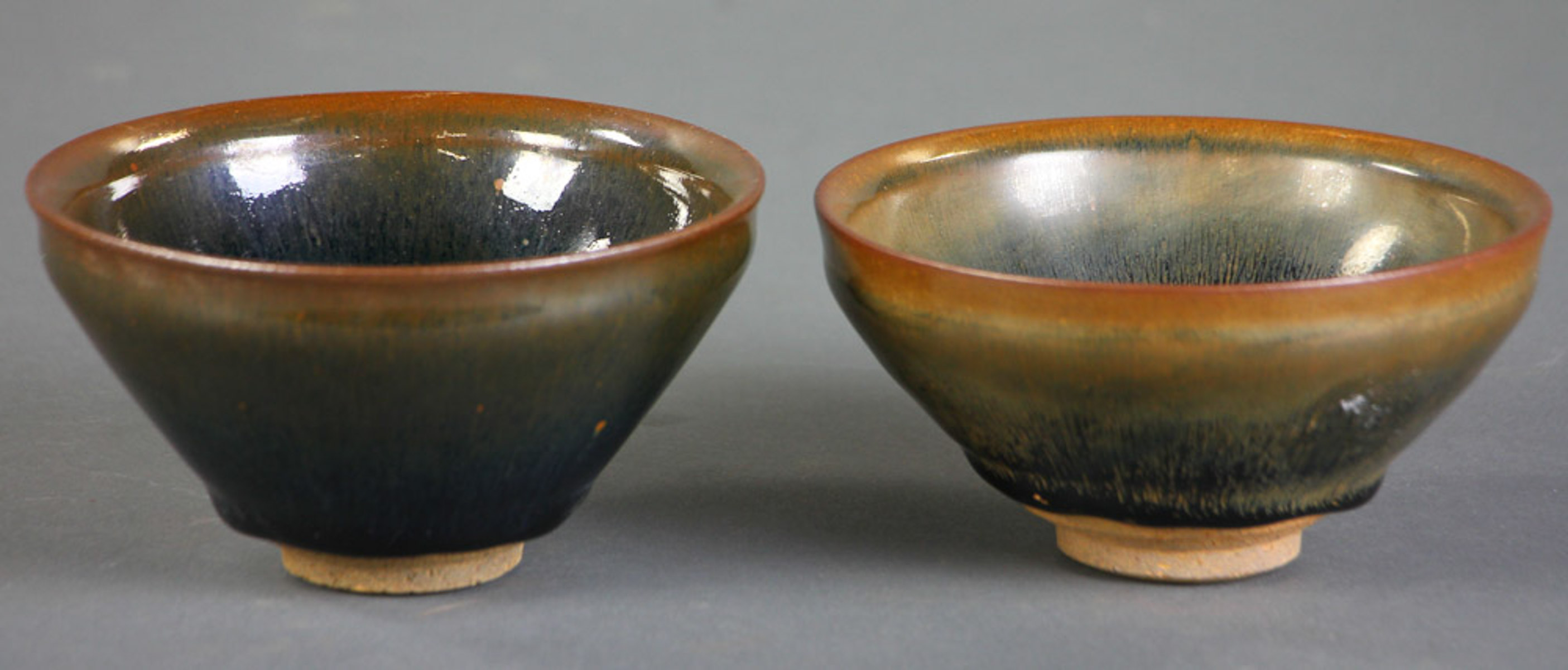 Two Jian-type black glazed porcelain bowls, 5" diameter.