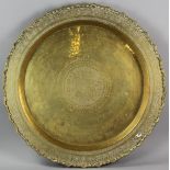 Indian brass tray with engraved floral and bird motif, 25 3/4" diameter.