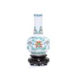 The vase is well shaped with a globular body depicting repeating lotus scrolls and ruyi-head