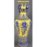 Chinese yellow glazed under blue and white porcelain vase with dragon design, 20th century, 24" H.