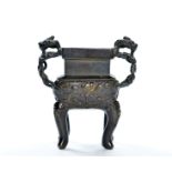 A very fine bronze burner with lotus carving and lion-mask legs, paired with two chi-long dragon