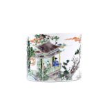 The cylindrical form pot brightly painted with a heavenly scene of court yard, scholars and