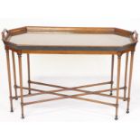 Regency-style cocktail table, 22" H x 37" W x 18" D.