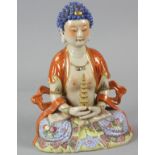 Chinese Famille Rose porcelain Buddha, 20th century, with carved seal mark on base, 9" H.