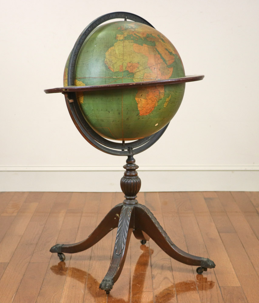 Old terrestrial globe on stand, W. & A. K. Johnston, Edinburgh, 41" H x 24" diameter.