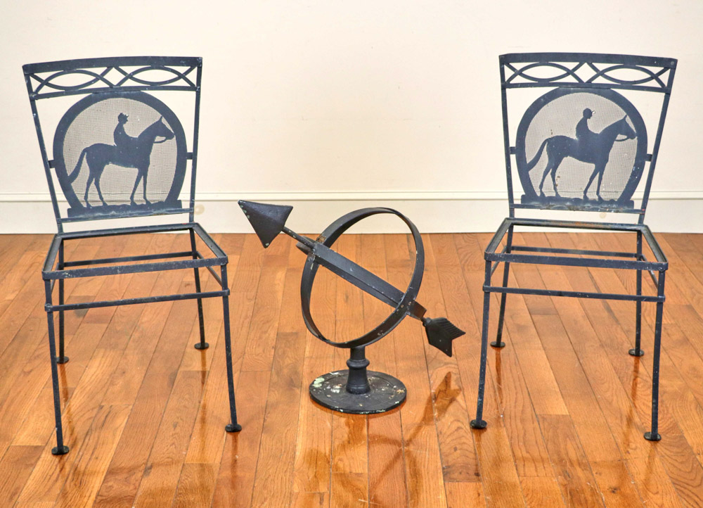 Pair of black-painted equestrian-motif wrought iron chairs, 31 1/2" H x 16" x 22" (overall),