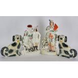 Group of four (4) 19th century Staffordshire figures, to include: one pair of mantel dogs with