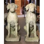 Pair of cement garden statuary seated dogs, 29" H. Provenance: Lifetime collection of Gretta O.