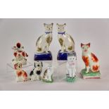 Collection of 19th century porcelain and pottery cat and dog figures to include Staffordshire