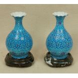 Pair of Persian enamel vases, 6" H, with stone bases 4" diameter.