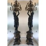 Pair of French-style bronze torchieres, 97" x 20".