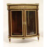 19th century French corner mahogany display cabinet, having fine ormolu bronze mounts, curved