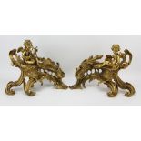 19th century French gilt bronze chenets with cherubs holding lyres, 14" H x 20" x 7".