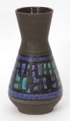 Austrian Pottery vase with a blue and green chequered design on a black ground, 30cms high
