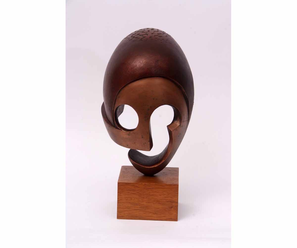 Alwyn (20th century) "The Mask", ceramic sculpture on pedestal base, 41cms high