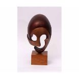 Alwyn (20th century) "The Mask", ceramic sculpture on pedestal base, 41cms high