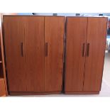 Mid-century E Gomme for G-Plan teak three-door wardrobe, together with a further two-door example (
