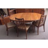 Mid-century G-Plan extending dining table and six chairs, 168 x 122cms fully extended