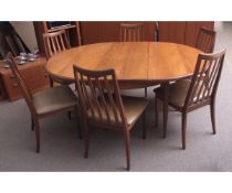 Mid-century G-Plan extending dining table and six chairs, 168 x 122cms fully extended