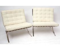 Pair of Barcelona style chairs, chromium frames with white leather upholstered padded seats, 78cms