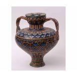 Large pottery Italian Majolica vase decorated in Castelli style with crossed handles and cover,