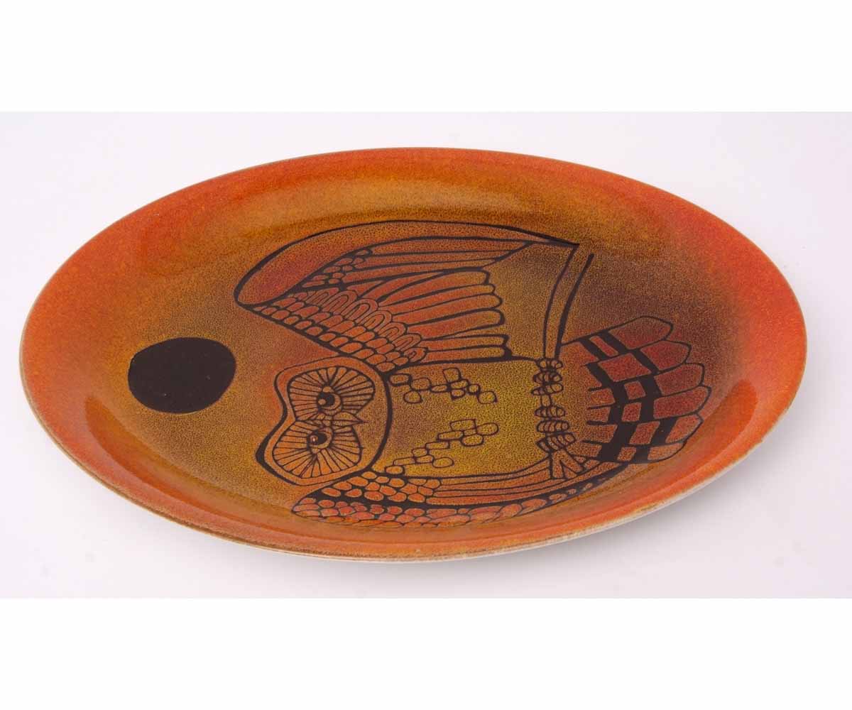 Poole Pottery Aegean oval shaped charger decorated with an owl, in typical colours