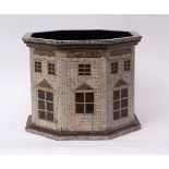 Egg-shell decorated octagonal paper mache jardiniere, in the style of Fornicetti, with house design,