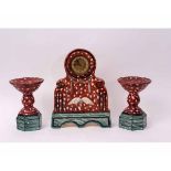 French pottery clock garniture with painted decoration