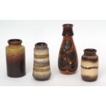Group of four West German pottery vases of various shapes, largest with moulded circular design on a