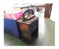Vintage cast iron book press, base plate approx 350 x 230mm, on wooden stand 100-120