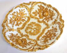 Large shaped Meissen dish with applied gilt decoration of florets (a/f), 30cms diam