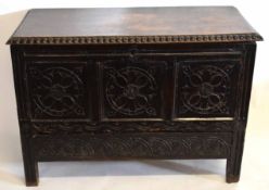 18th century oak coffer with three carved panelled front, 107cms wide x 49cms deep x 75cms high