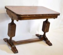 Early 20th century Arts & Crafts style oak rectangular topped coffee table supported on two reeded