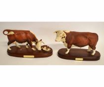 Pair of Staffordshire bull entitled "Hereford Bull" and a second one entitled "Hereford Cow and