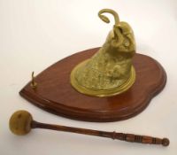 Good quality wall mounted gong holder modelled as a brass eagle's head with serpent clutched in