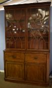 Late 18th/early 19th century mahogany and satinwood banded secretaire bookcase, the top with two