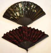 Pair of good quality silk and painted fans with a daisy and floral decoration with ebonised detail