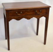 Georgian mahogany single full width drawer side table supported on four square legs with brass