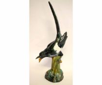 Impressive Minton pottery model of a magpie, after Meissen, the bird modelled on a tree stump, 56cms