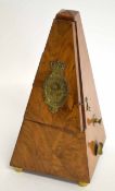 Triangular wooden metronome with applied brass mounts entitled "Best English Make Metronome" by