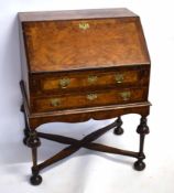 Queen Anne style walnut bureau with drop front with pigeonholed and fitted interior over two full