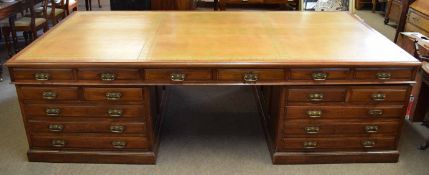 Extremely large 19th century mahogany twin pedestal partner's desk with brown and tooled leather